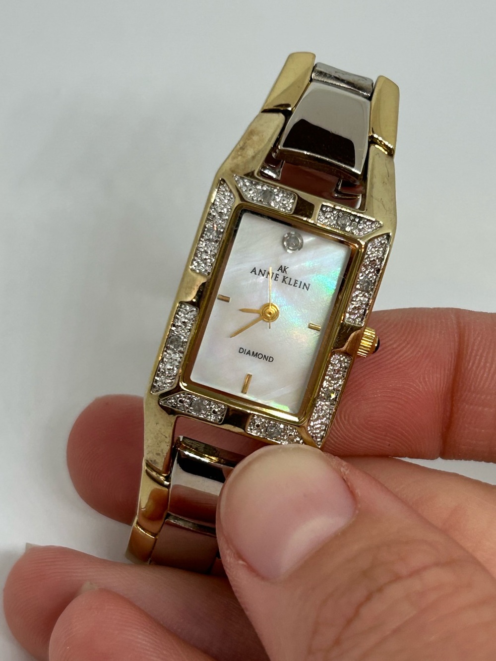 Anne Klein Gold-Tone Crystal Accent Bracelet Watch with Mother-of-Pearl Dial